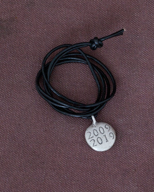 Indigofera Logo Silver Necklace