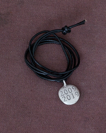 Indigofera Logo Silver Necklace